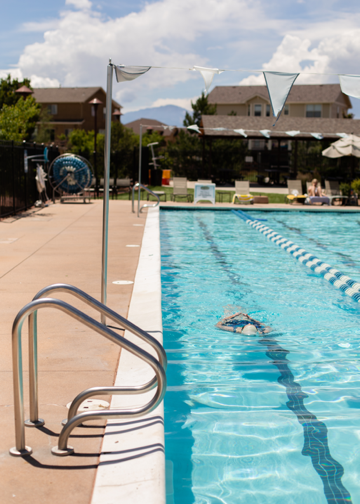 A person does laps in a lap pool